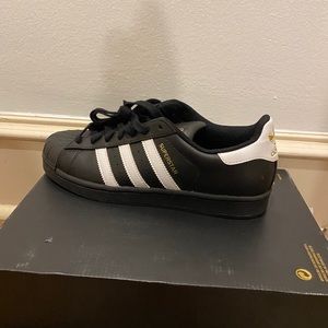 Black and white adidas all-star sneakers